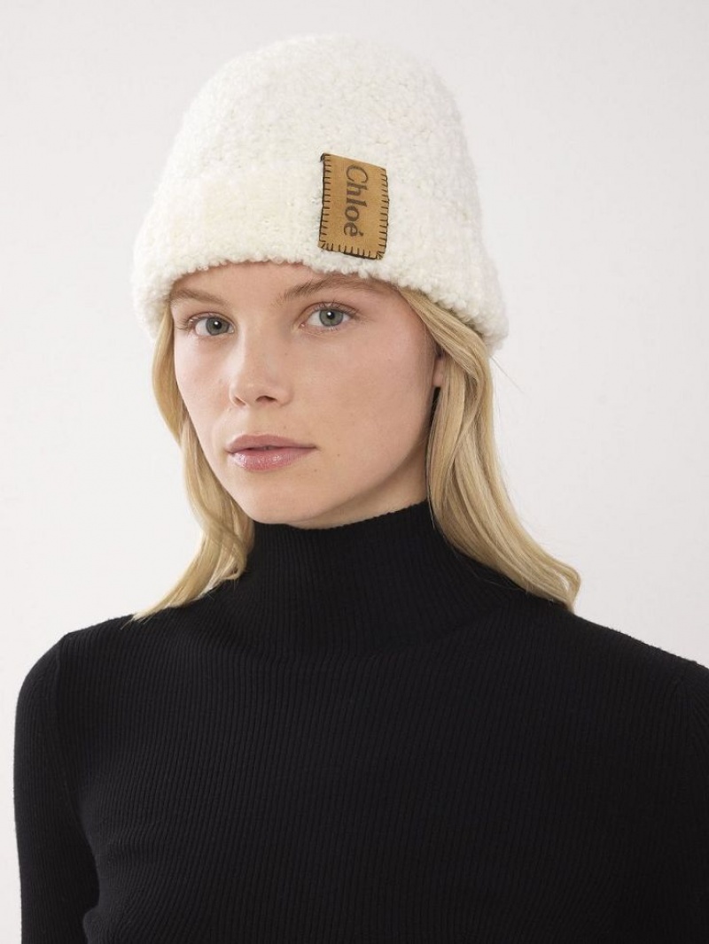 Chloe Curly Knit Beanie Hüte Beige | CHE-SR14475